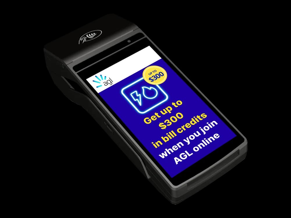 An AGL bill-credits ad running on a payment terminal